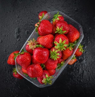 Strawberries on a vintage background as detailed close-up shot, selective focus