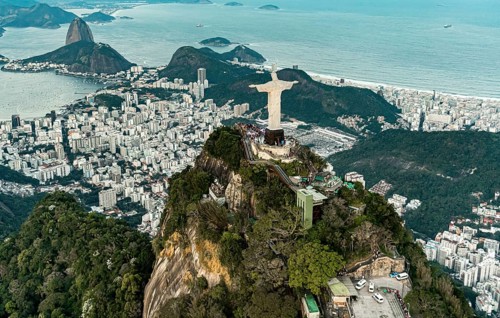 Cristo Redentor statue in Rio de Janeiro (aerial shot made from a helicopter) during a spectacular