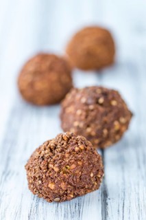 Wooden table with Falafels (close-up shot, selective focus)