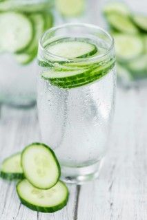 Homemade Cucumber Water on vintage background selective focus, close-up shot