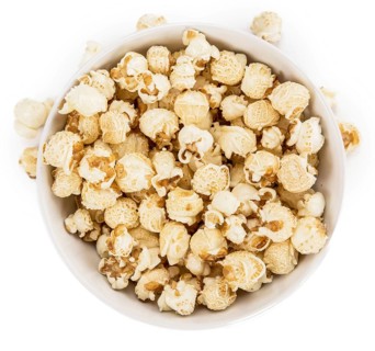 Portion of Popcorn as detailed close-up shot isolated on white background