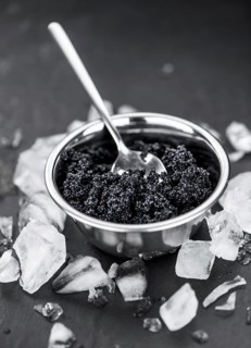 Caviar on a vintage looking slate slab (selective focus)