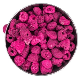 Portion of Dried Raspberries as detailed close-up shot isolated on white background