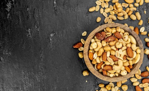 Portion of roasted nuts as detailed close up shot (selective focus)