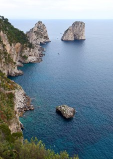 Faraglioni, famous giant rocks, Capri island in Italy
