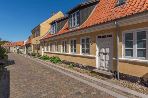 Old town of Rudkobing, renovated houses, colourful row of houses, dormers, decorative design,