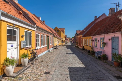 Old town of Rudkobing, renovated houses, colourful row of houses, dormers, decorative design,