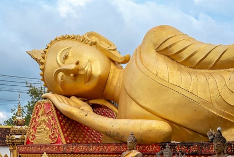 Giant Reclining Buddha near Wat That Luang Temple, Vientiane, Laos, Asia