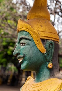 Green-faced guardian statue, Wat Kao Nhot temple, Vientiane, Laos, Asia