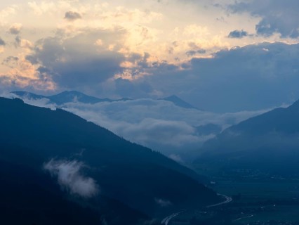 Evening clouds and fog over the Liesingtal, in the valley the village of Traboch, Schoberpass