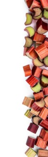 Freshly chopped Rhubarb isolated on white background as detailed close up shot