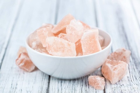 Portion of pink himalayan Salt (detailed close-up shot, selective focus)