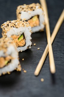 Portion of fresh made Sushi (detailed close-up shot, selective focus)