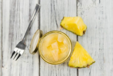 Portion of fresh Preserved Pineapple pieces close-up shot, selective focus