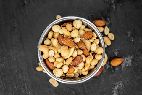 Portion of roasted nuts as detailed close up shot (selective focus)