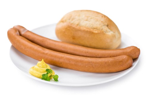 Portion of Wiener Sausages (as close-up shot) isolated on white background