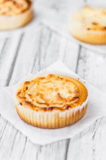Homemade Cheesecake on vintage background (selective focus, close-up shot)