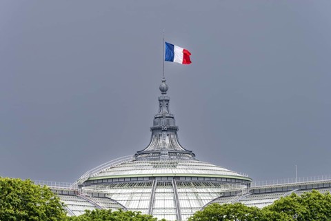 The French national flag, tricolour, on the Grand Palais, Paris, ÃŽle-de-France, France, Europe