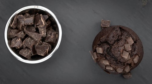 Portion of healthy Chocolate Muffins on a slate slab (selective focus)