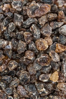 Portion of brown Rock Candy as detailed close-up shot (selective focus)