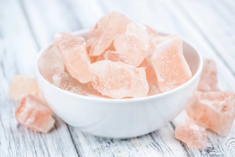 Portion of pink himalayan Salt (detailed close-up shot, selective focus)