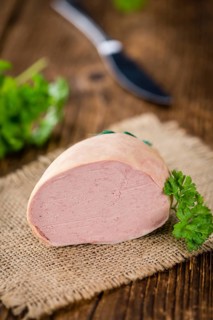 Portion of fresh made Liverwurst (close-up shot, selective focus)