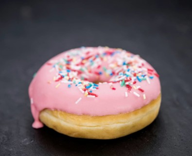 Portion of some Donuts as detailed close-up shot (fresh made, selective focus)