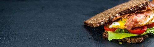 Fresh made Bacon and Egg Sandwich (selective focus, close-up shot)