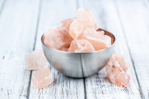 Portion of pink himalayan Salt (detailed close-up shot, selective focus)