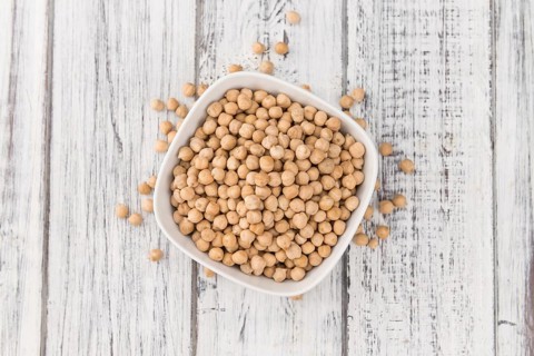 Portion of fresh Chickpeas close-up shot, selective focus