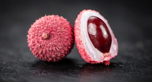 Portion of Litchis as detailed close up shot on a slate slab (selective focus)