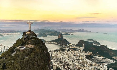 Cristo Redentor statue in Rio de Janeiro (aerial shot made from a helicopter) during a spectacular