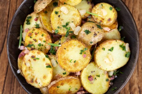 Portion of fresh made Fried Potatoes (selective focus, close-up)