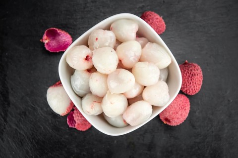 Portion of fresh Lychees (close-up shot, selective focus)