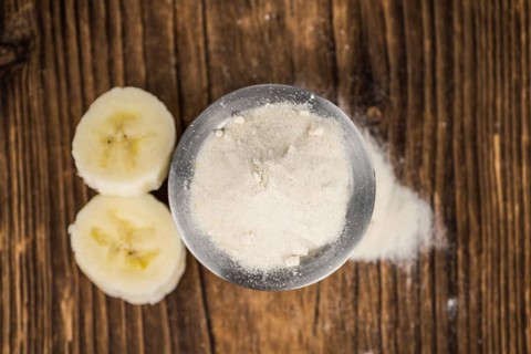 Portion of fresh Banana Powder close-up shot, selective focus