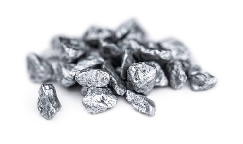 Heap of silver nuggets isolated on white background (close up)