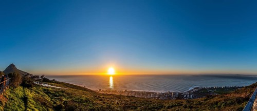 Tourists watching the sunset from Signal Hill, Cape Town South Africa during winter season