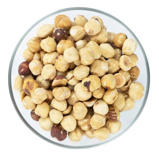 Peeled Hazelnuts isolated on white background (close up shot)