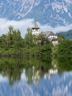 Morning atmosphere, reflection, Grundlsee Castle in the morning light, Grundlsee, Salzkammergut,