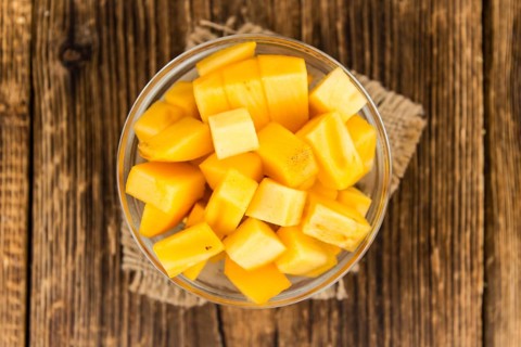 Portion of fresh made Kaki fruits (close-up shot, selective focus)
