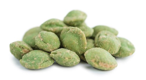 Peanuts (with Wasabi flavor) isolated on white background (selective focus, close-up shot)