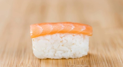 Some fresh made Sushi on a wooden table (selective focus, close-up shot)