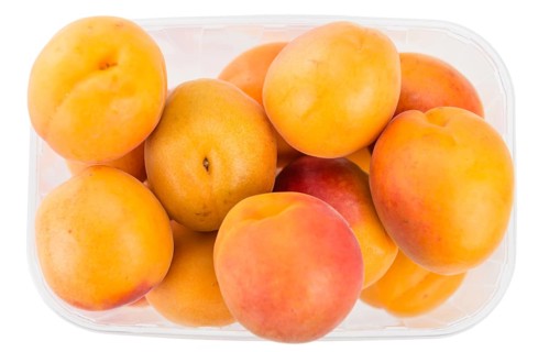 Apricots isolated on white background (selective focus, close-up shot)