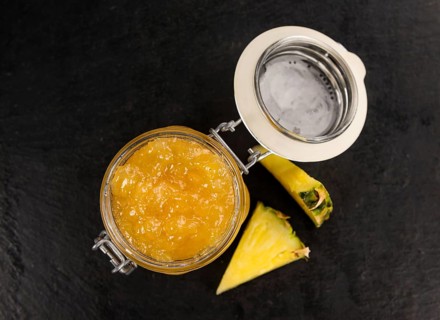 Portion of Pineapple Jam on a rustic slate slab, selective focus, close-up shot