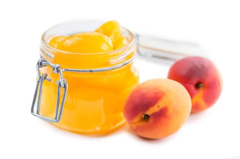 Portion of fresh made Pickled Apricots isolated on white background