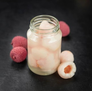 Preserved Lychees on a vintage background as detailed close-up shot (selective focus)