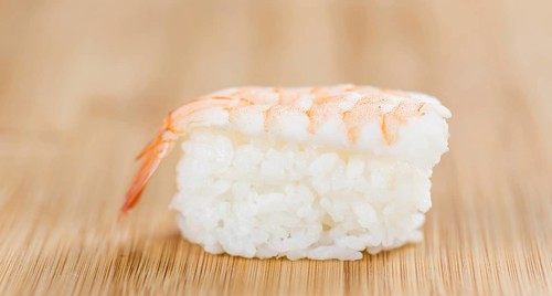 Portion of fresh made Sushi (detailed close-up shot, selective focus)