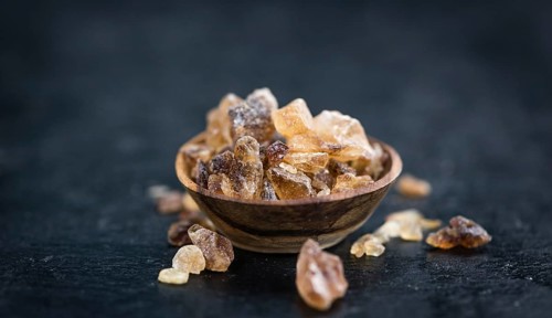 Slate slab with brown Rock Candy (close-up shot, selective focus)