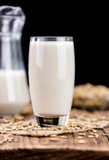 Portion of Oat Milk as detailed close-up shot, selective focus