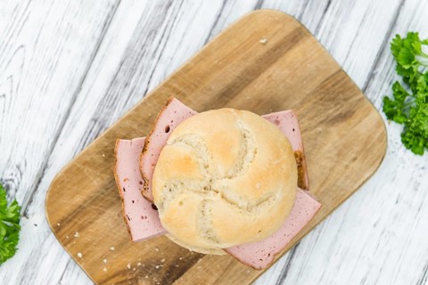 Meat Loaf on rustic wooden background (close-up shot)